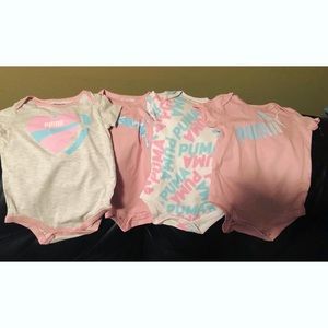 New 6-9 months PUMA onesies